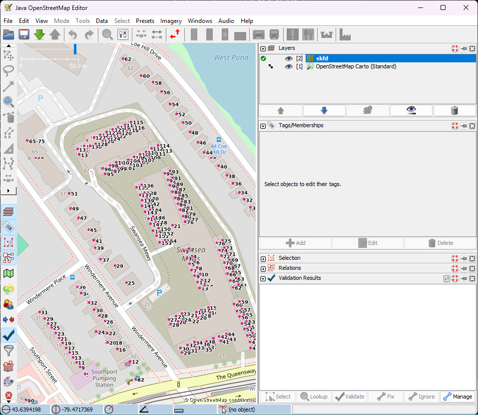 The raster layer in JOSM: house numbers rendered as text over aerial imagery